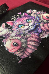 black vegan leather clutch with alice in wonderland print