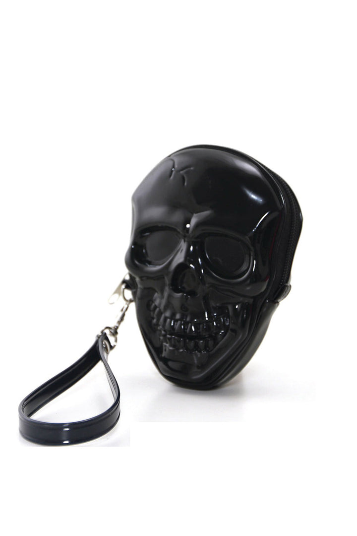 Black skull-shaped coin purse pouch with a strap on a white background