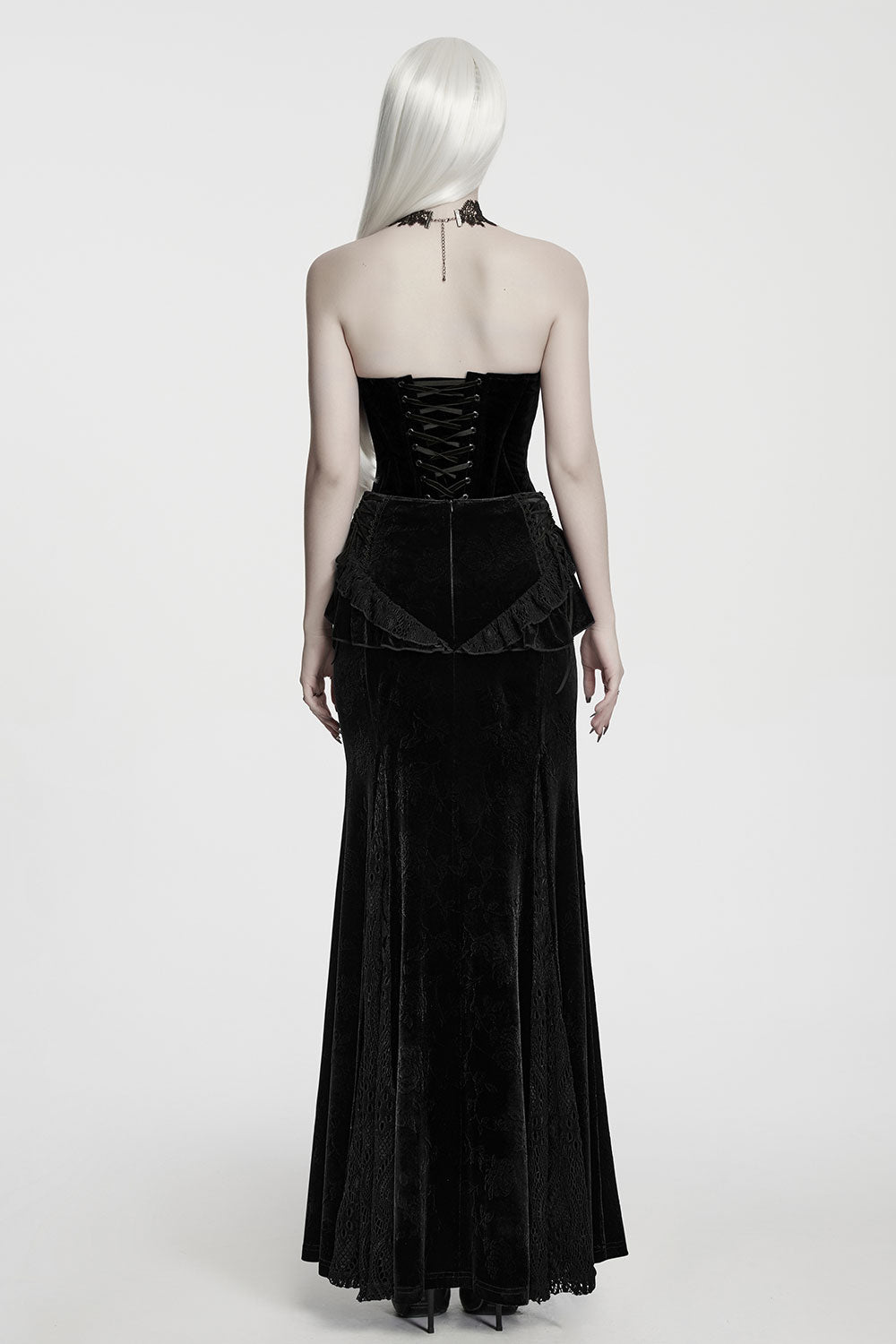back view of model wearing a black velvet corset from Punk Rave