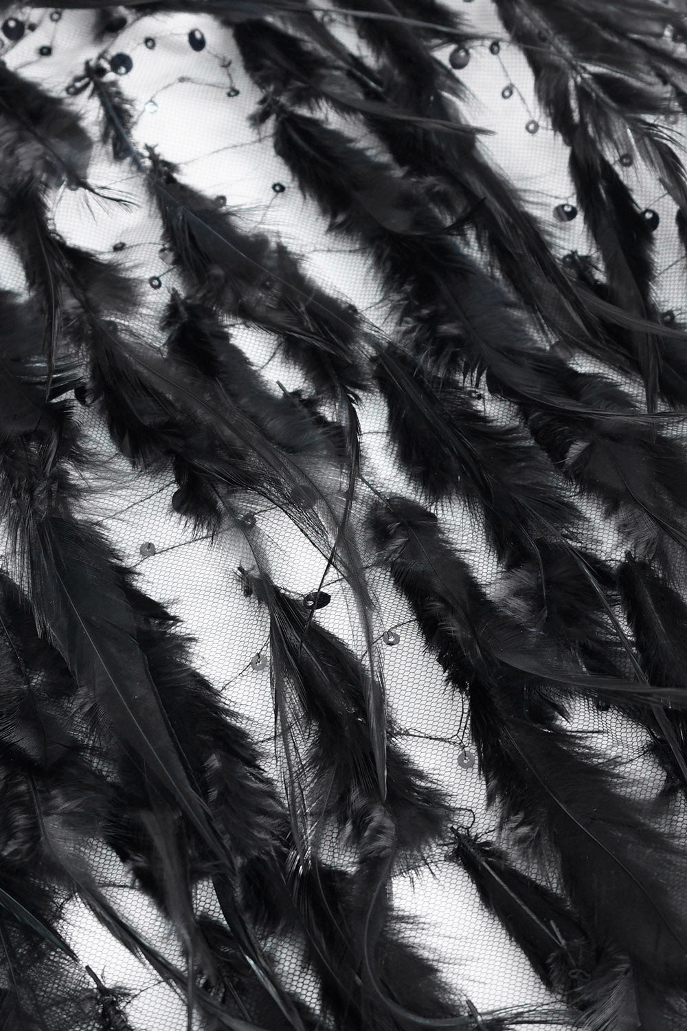 black feathered cloak