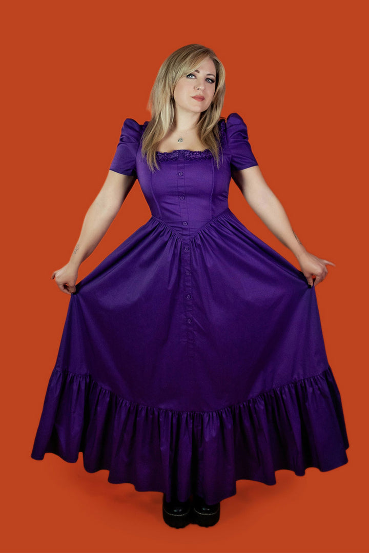 deep rich purple long gothic maxi gown with ruffle hem