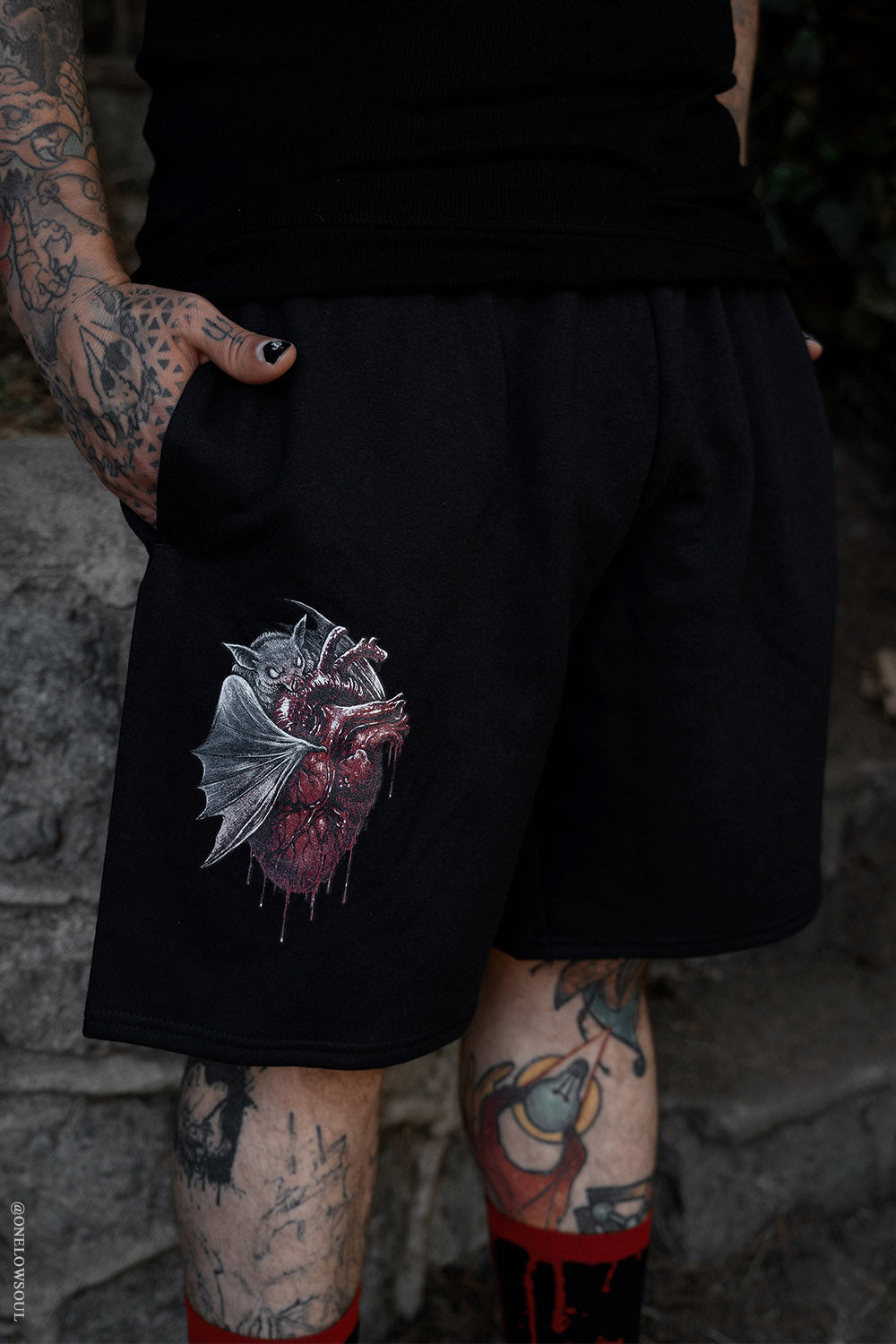 mens gothic short with bat printed graphic 