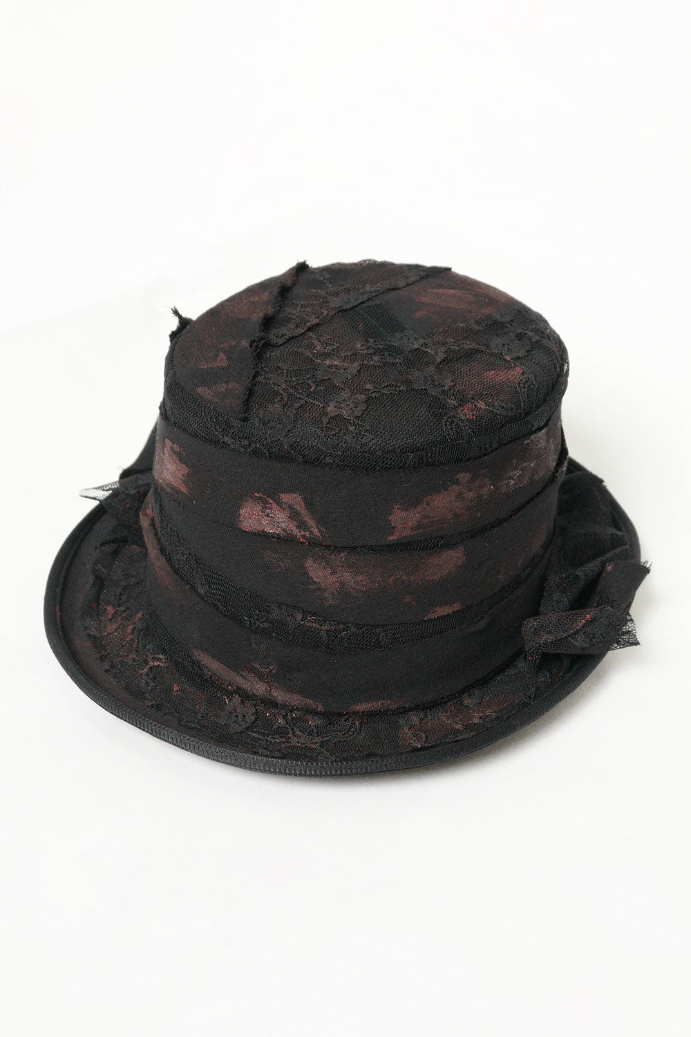black top hat with red paint accents