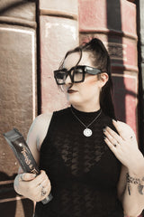 dark academia bracelet with feather, teras, and moth-butterfly charms 