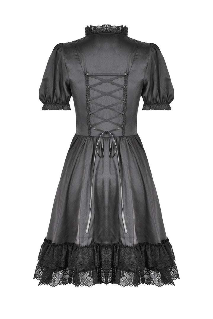 Black lace-up dress with ruffled hem on a white background