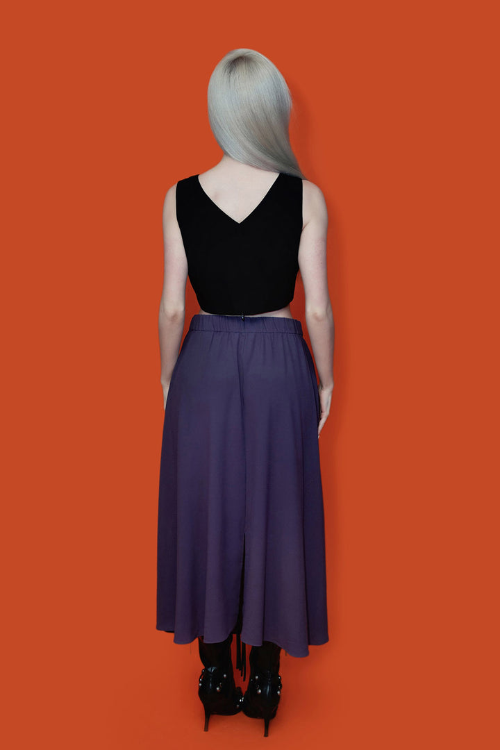 high-waisted flowing eggplant purple midi length skirt