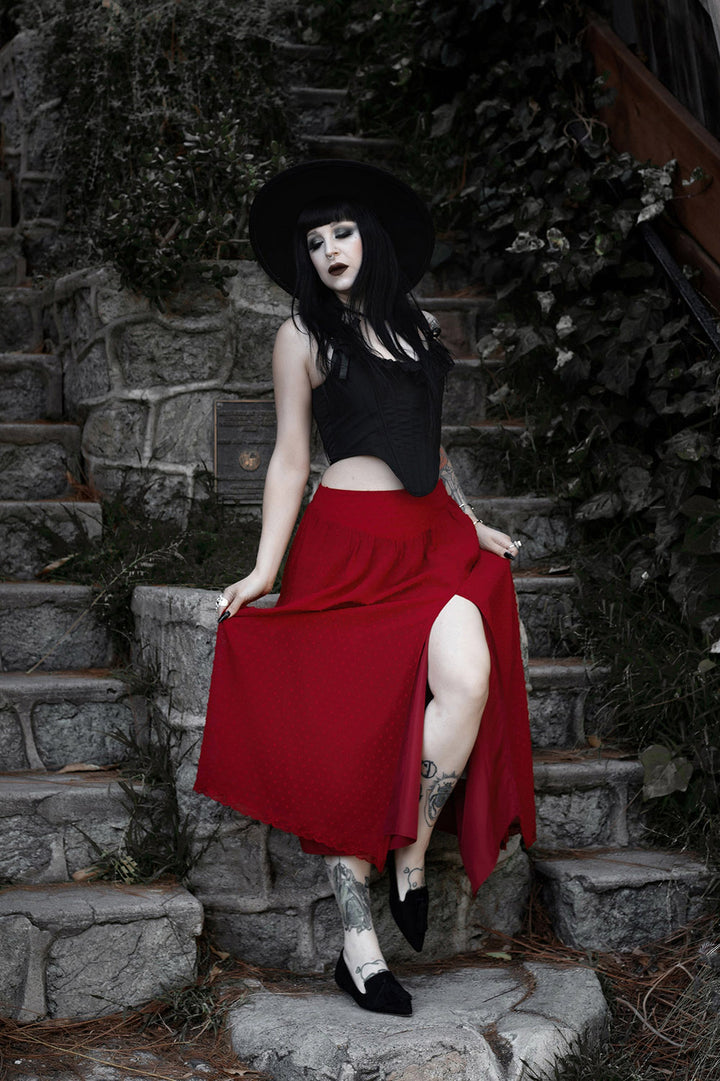 red high-waisted skirt with leg slit