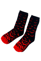 Black socks with red pattern and vampirefreaks brand name on a white background