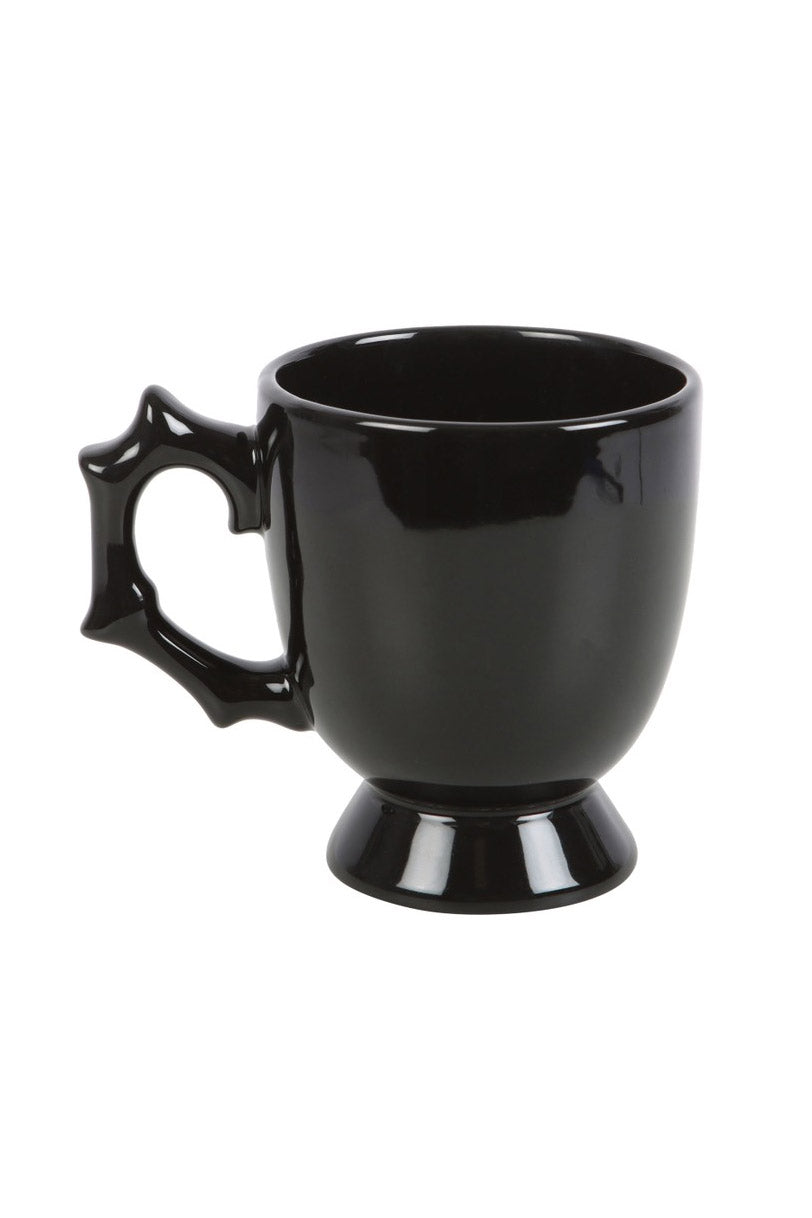 whimsical handle gothic teacup