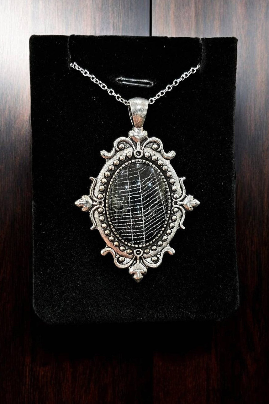 goth cameo frame necklace with preserved spiderweb