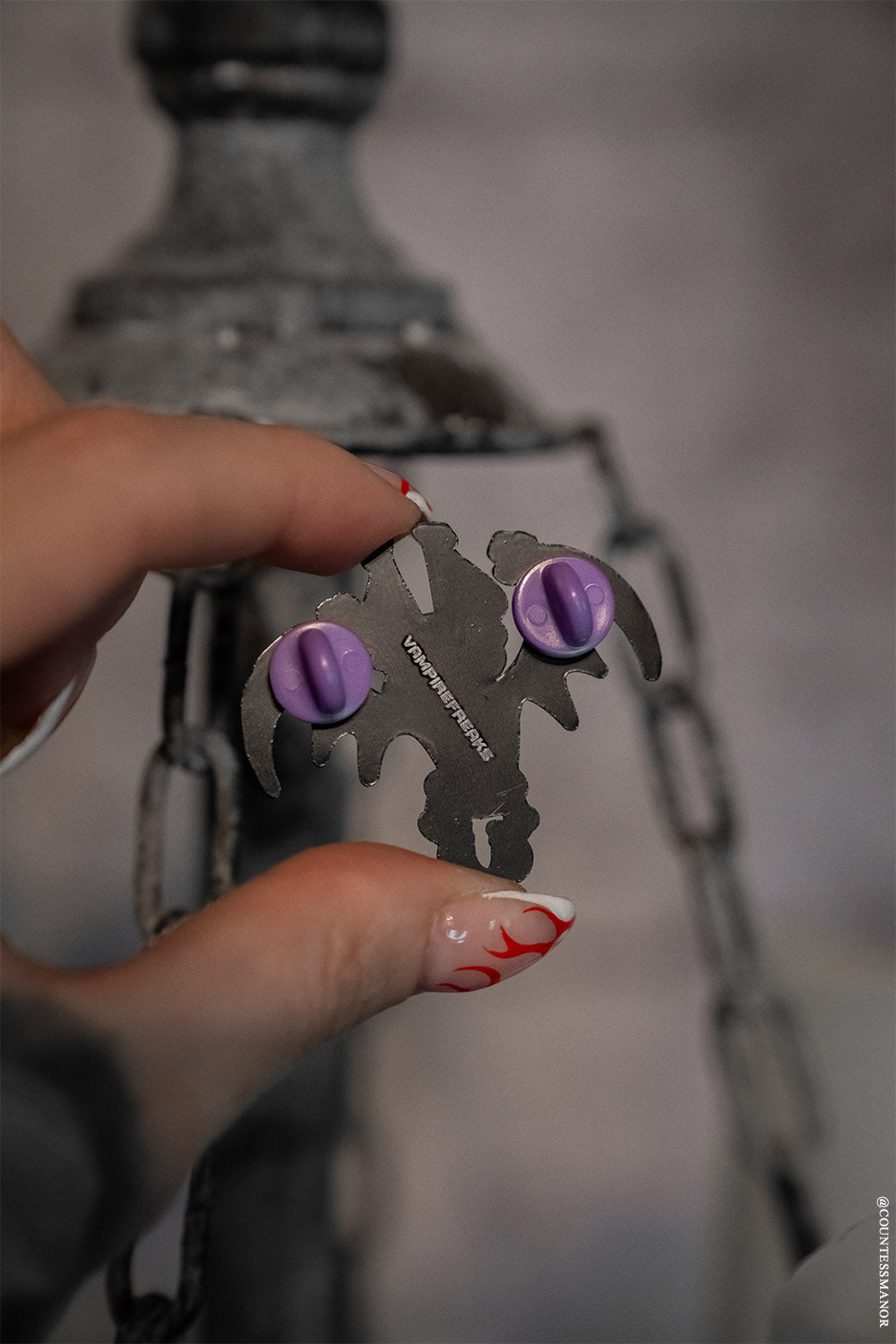 skeleton bat enamel pin with purple back buttons 