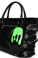 slime shaped coin purse on a gothic handbag 