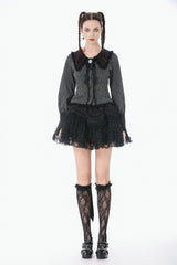 gothic woman wearing a long sleeves womens striped blouse with puffed sleeves and bowtie