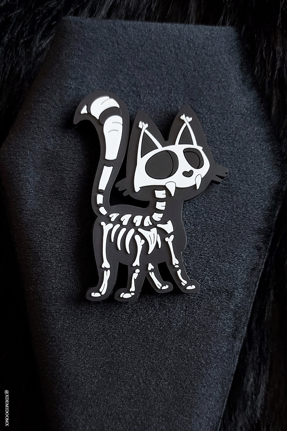 large rubber skeleton cat magnet