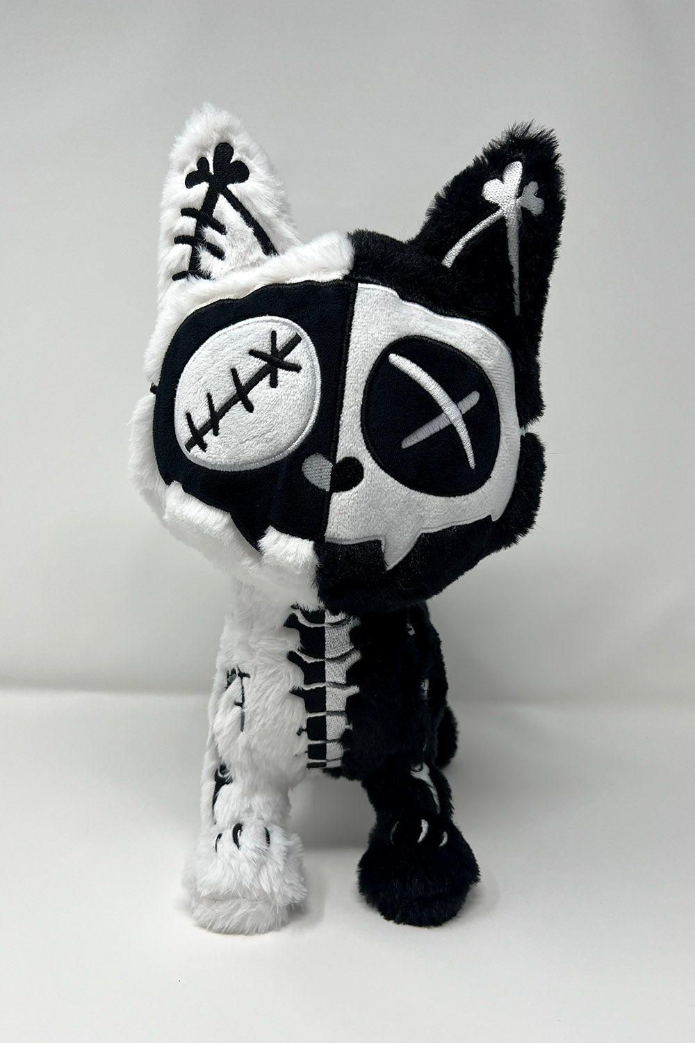 Black and white skeleton cat plush toy studded animal