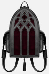 Gothic-style backpack with stained glass design on a gray background