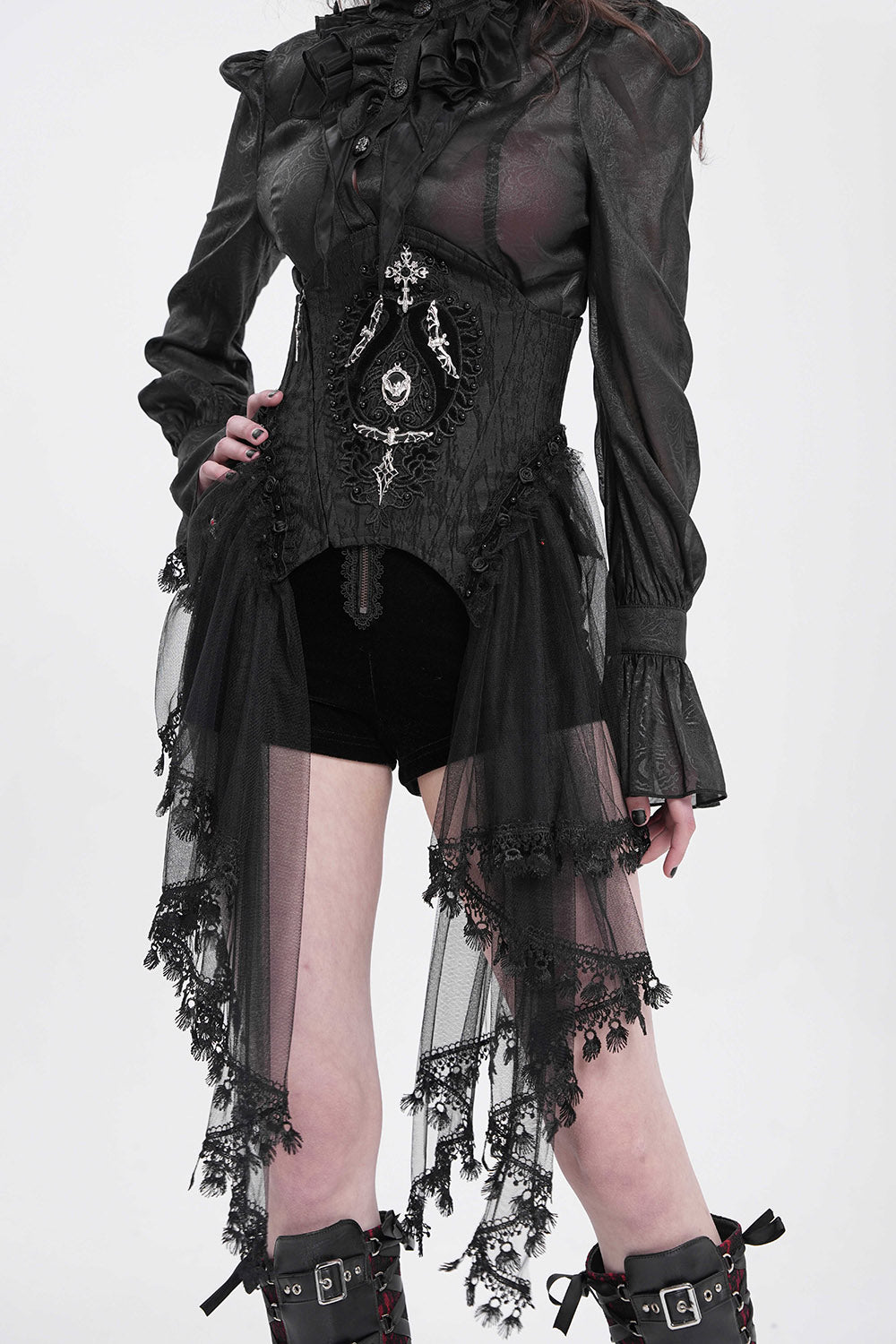 Gothic-style black outfit with intricate details on a white background