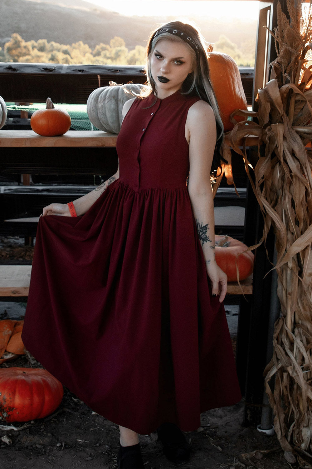 high neck button-up red sleeveless dress with pockets by lively ghosts 