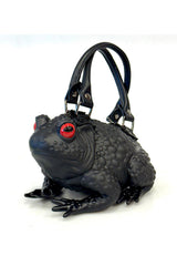 Windy Willow toad shaped handbag with red eyes