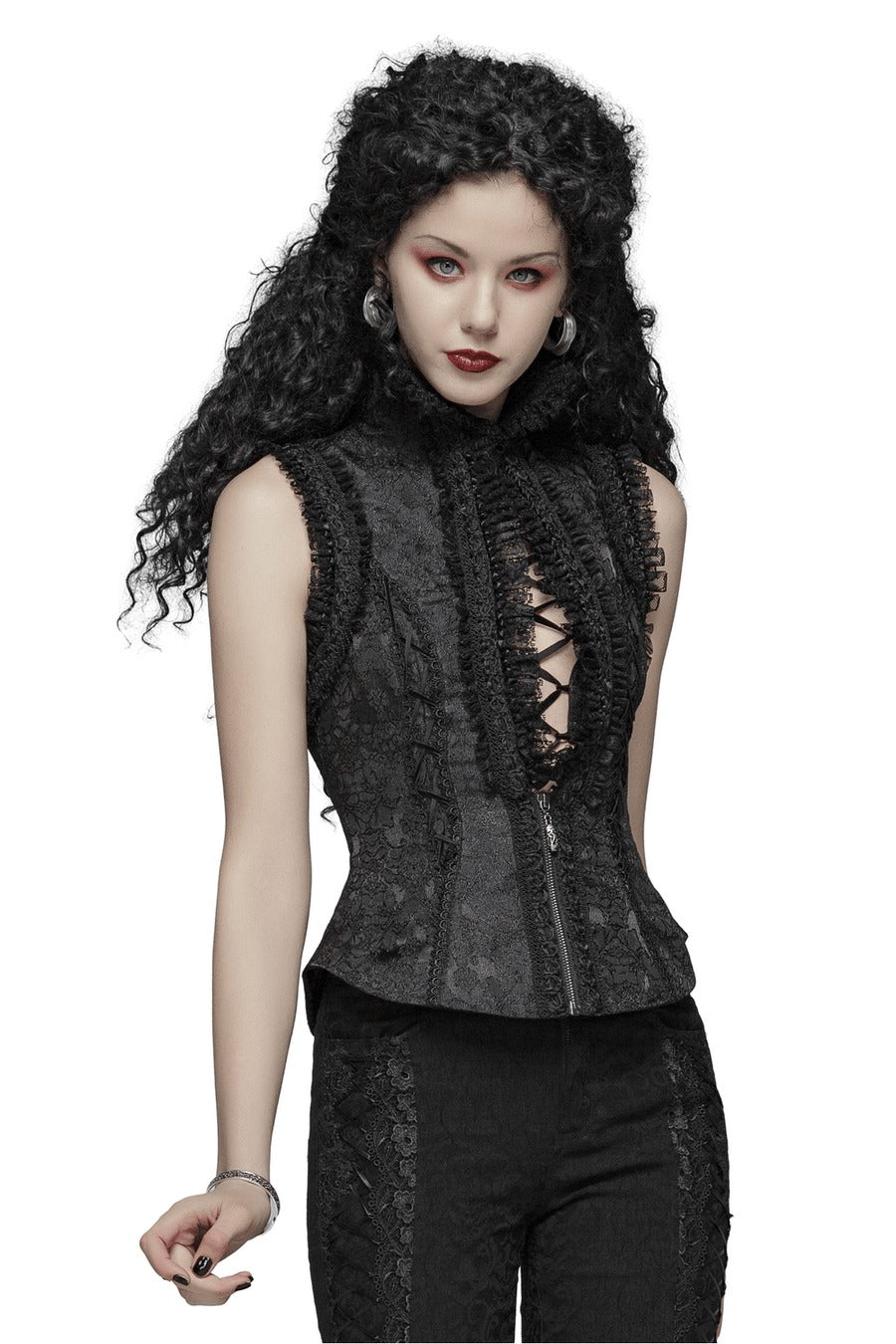 Woman wearing a black lace-up top with a white background