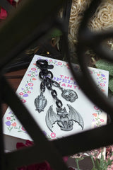 keychain featuring gothic pendants 