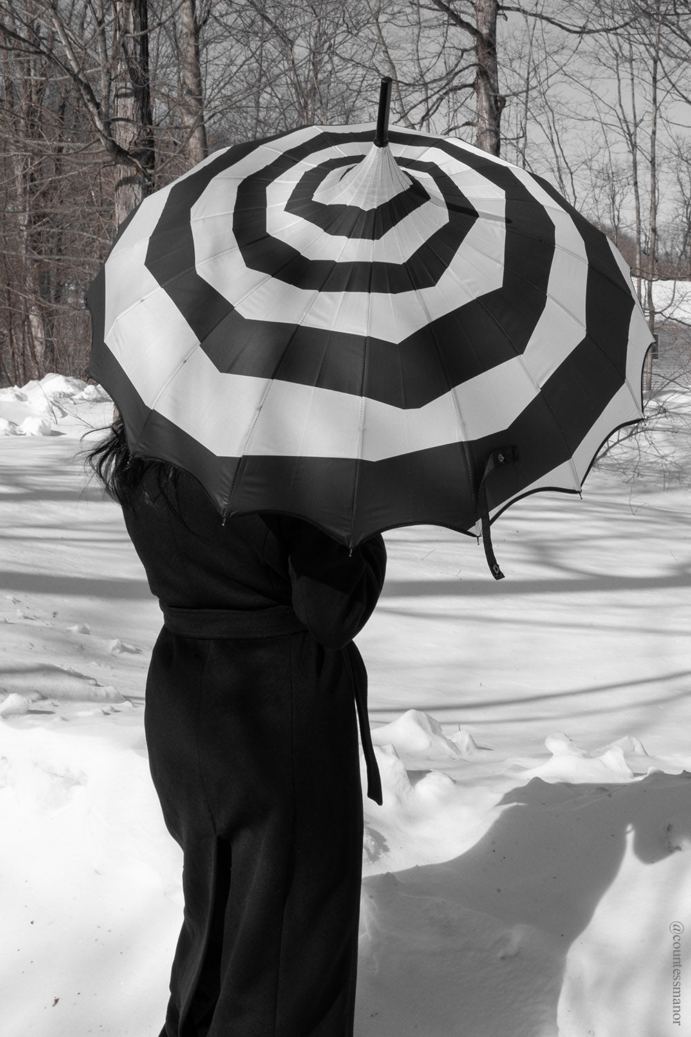 whimsical dark black and white striped Wednesday addams inspired umbrella pagoda 