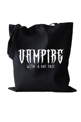 Black tote bag with 'Vampire with a Day Pass' text on a white background