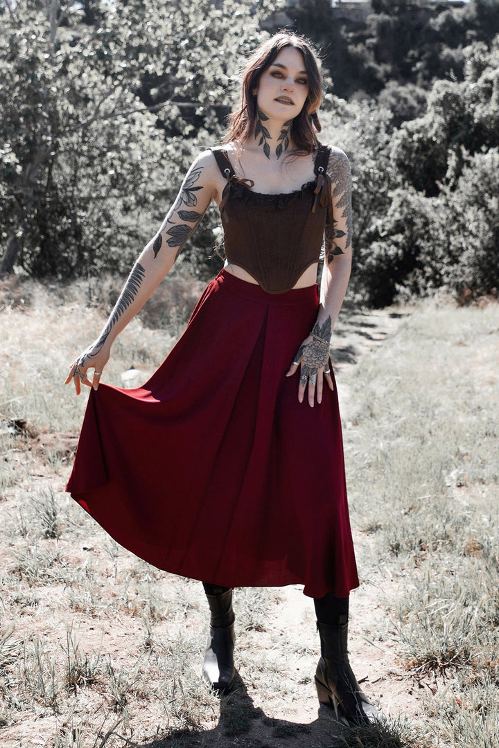 pleated dark red skirt