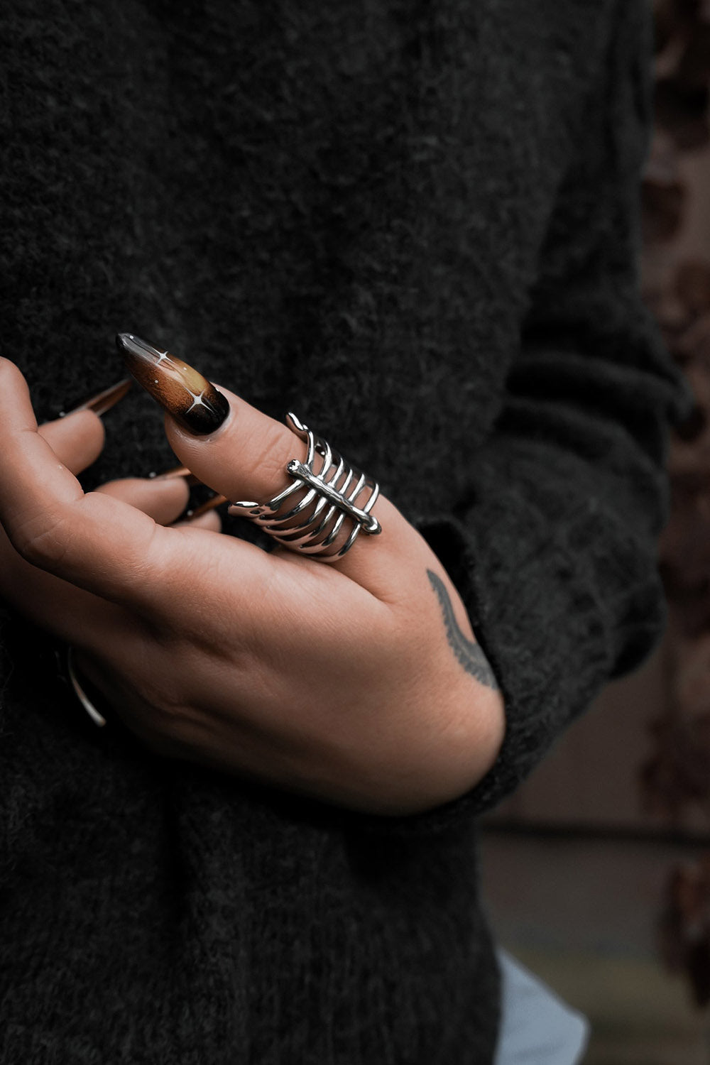 stainless steel ribcage shaped ring