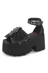 fishnet sandals with a chunky heel and skeleton charm by demonia 