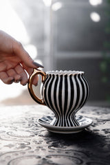 black and white striped tea cup