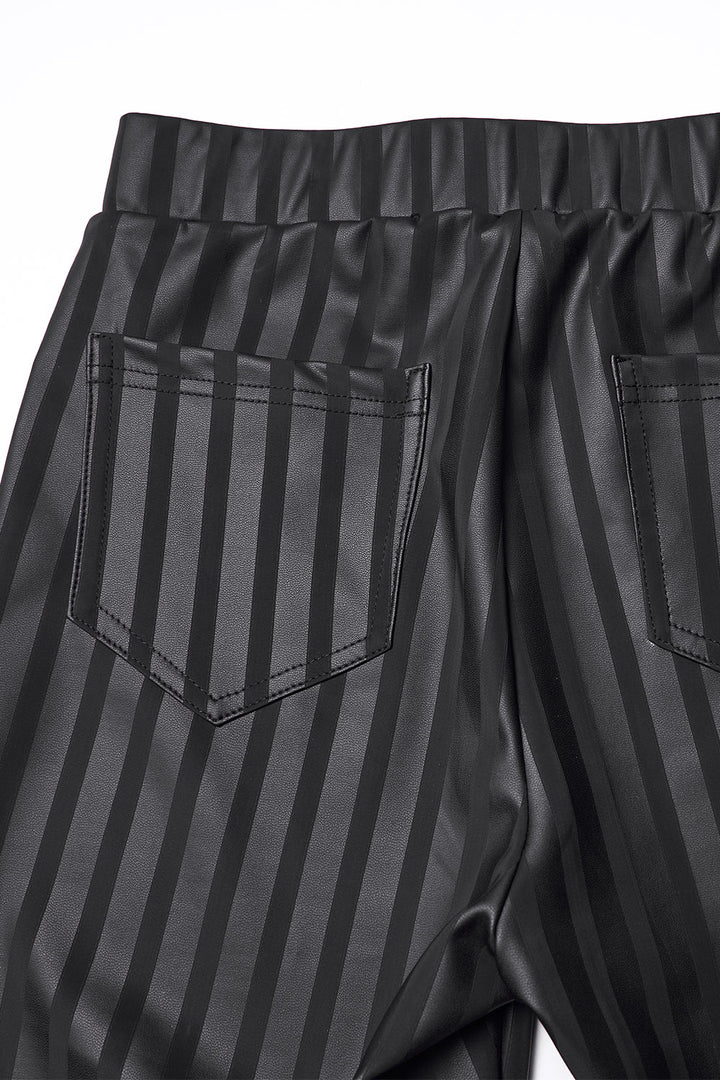 emo leggings with pockets, buckles, and straps