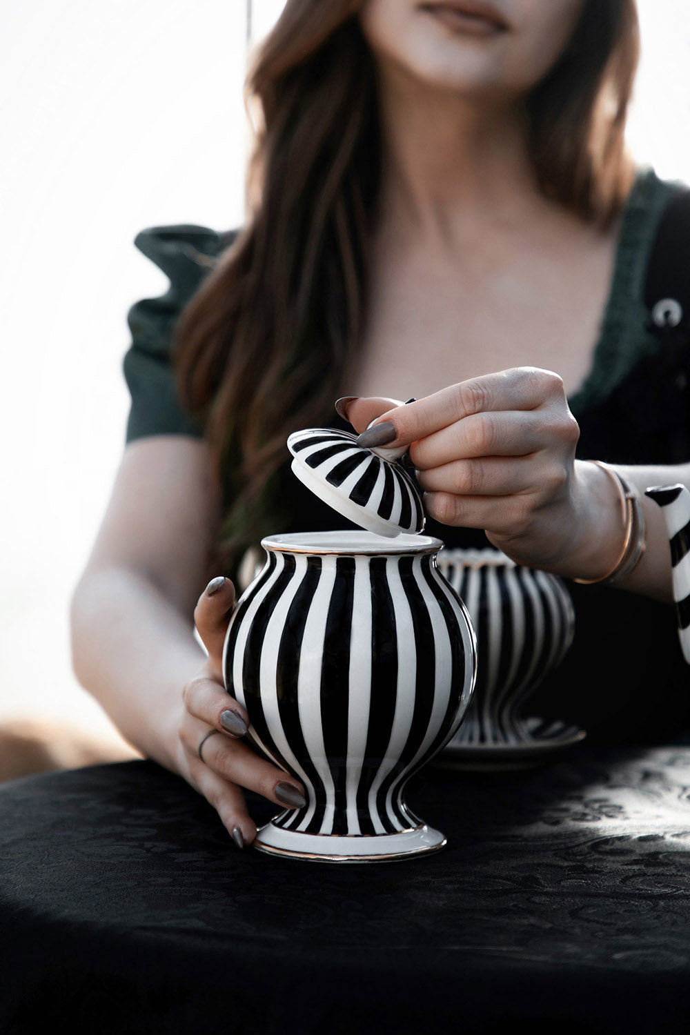 lively ghosts tea bag container made of cermaic