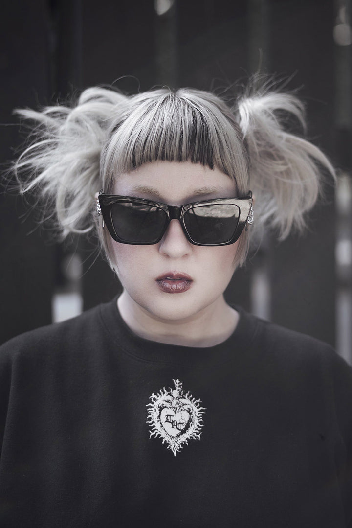 black shiny large cat eye sunglasses by the pretty cult