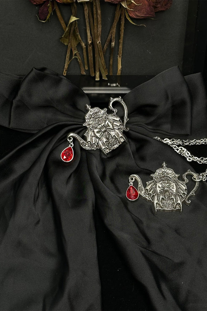 alice in wonderland tea pot hair bow  and necklace 