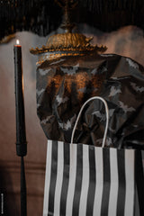 striped gift bag with gothic bat pattern tissue paper