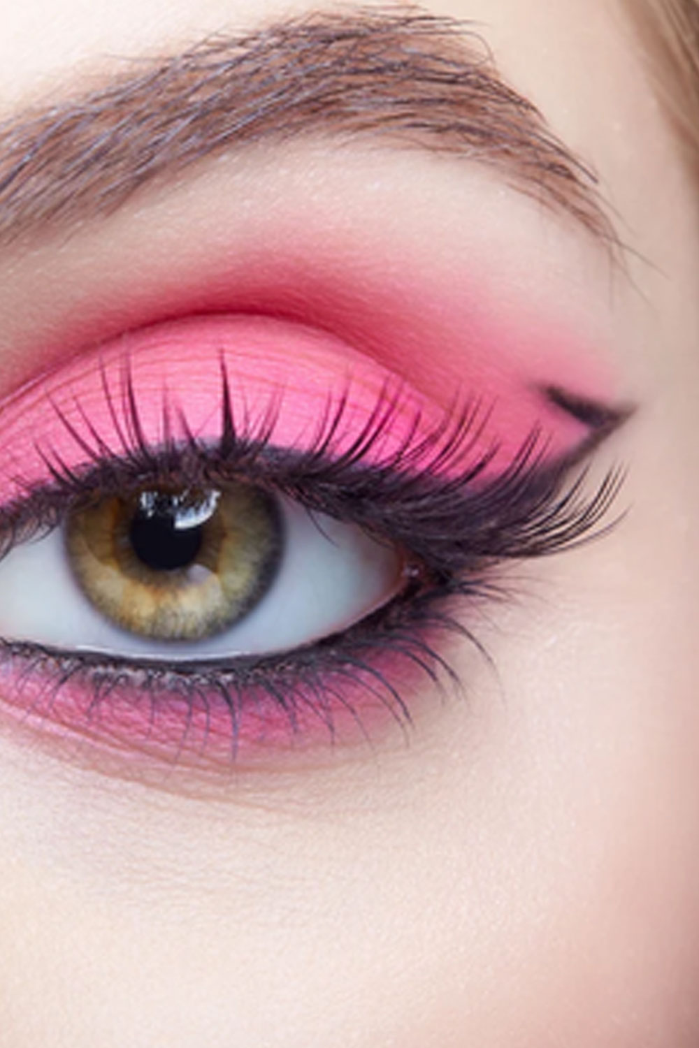 Close-up of dramatic black cat-eye eyeliner creating a sharp winged punk makeup look with Witchy Liner