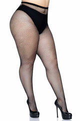 Black fishnet stockings worn with black high heels on a white background