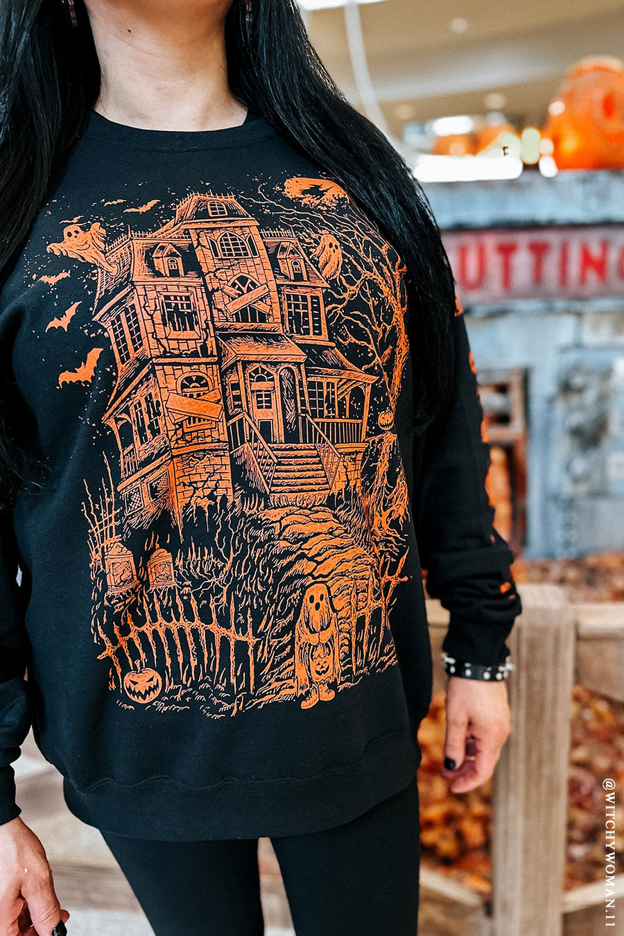 orange haunted mansion halloween sweatshirt