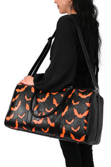 pumpkin orange and black halloween bat duffel bag