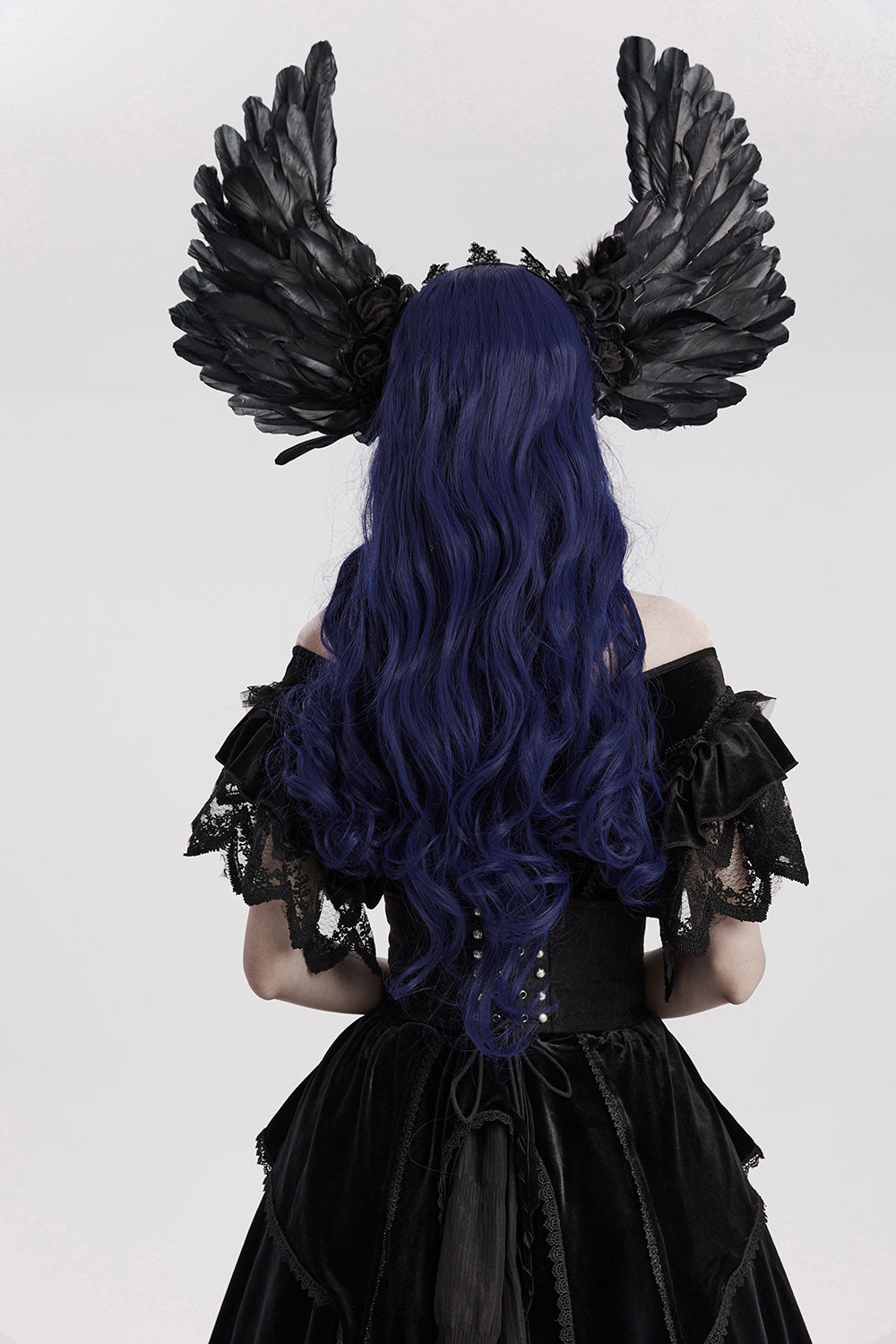 black feathered headpiece