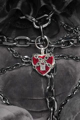 chained punk rabbit plush toy wearing a lolita ruffle headband and heart locket 