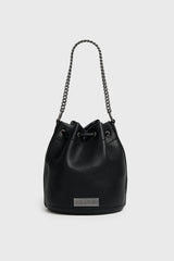 Black leather bucket bag with chain handle on a light gray background