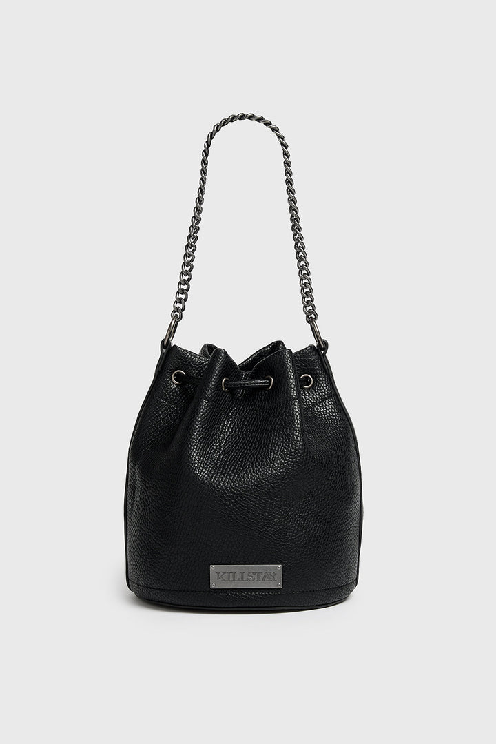 Black leather bucket bag with chain handle on a light gray background
