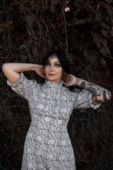 quirky whimsical dark puffed sleeve high collar ruffle dress by lively ghosts 