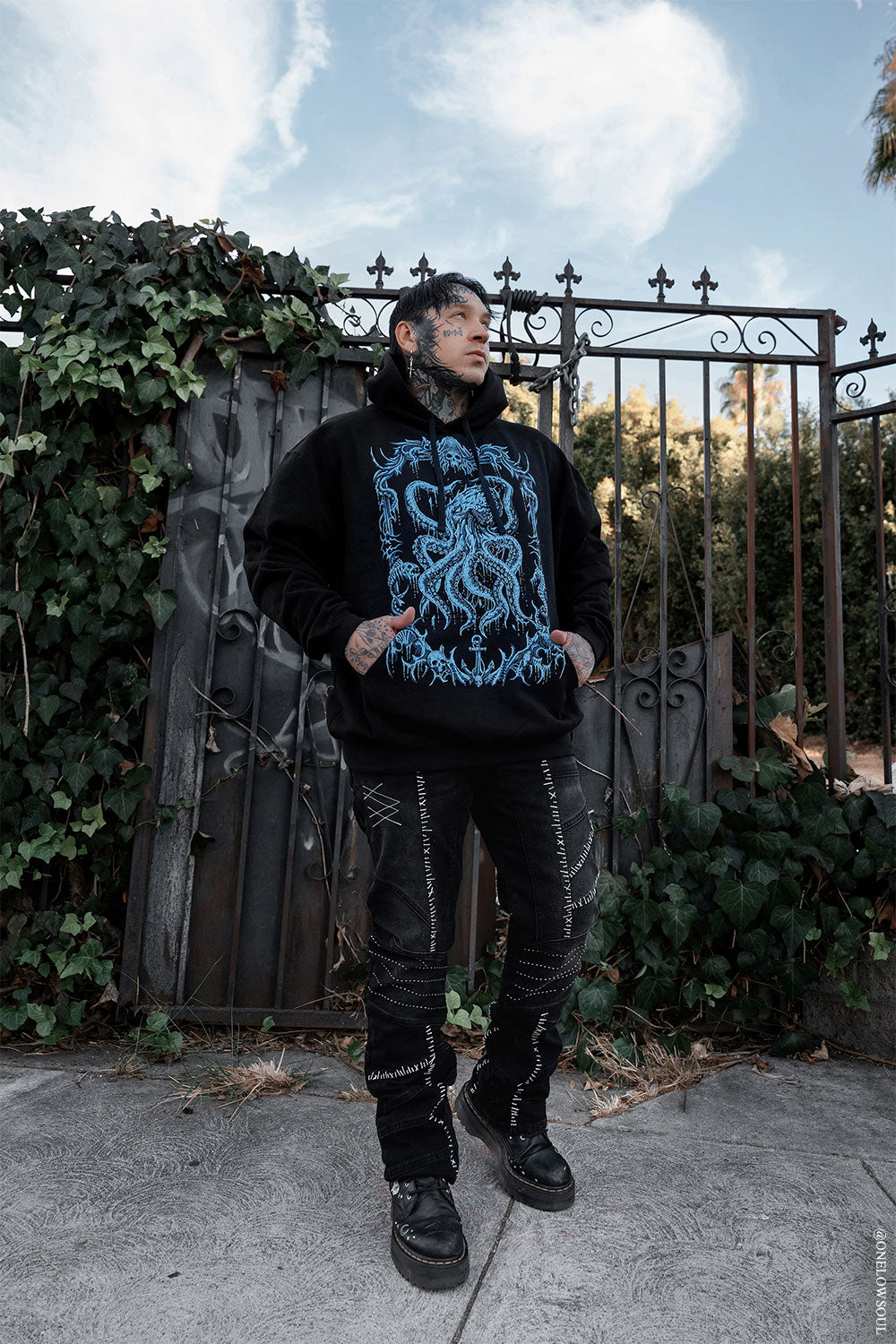 black kraken hoodie by VampireFreaks featuring a detailed blue sea monster design for goth punk grunge and dark fantasy style