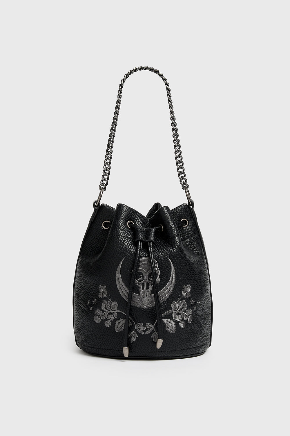 Black bucket bag with floral and skull embroidery on a white background