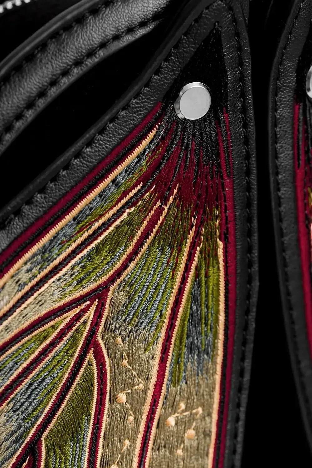embroidered cottagecore backpack with attached wings