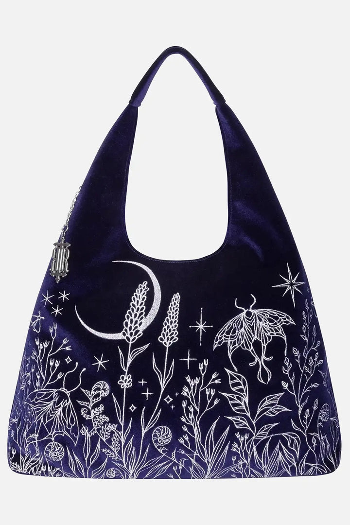 Navy blue bag with silver floral and celestial design on a white background