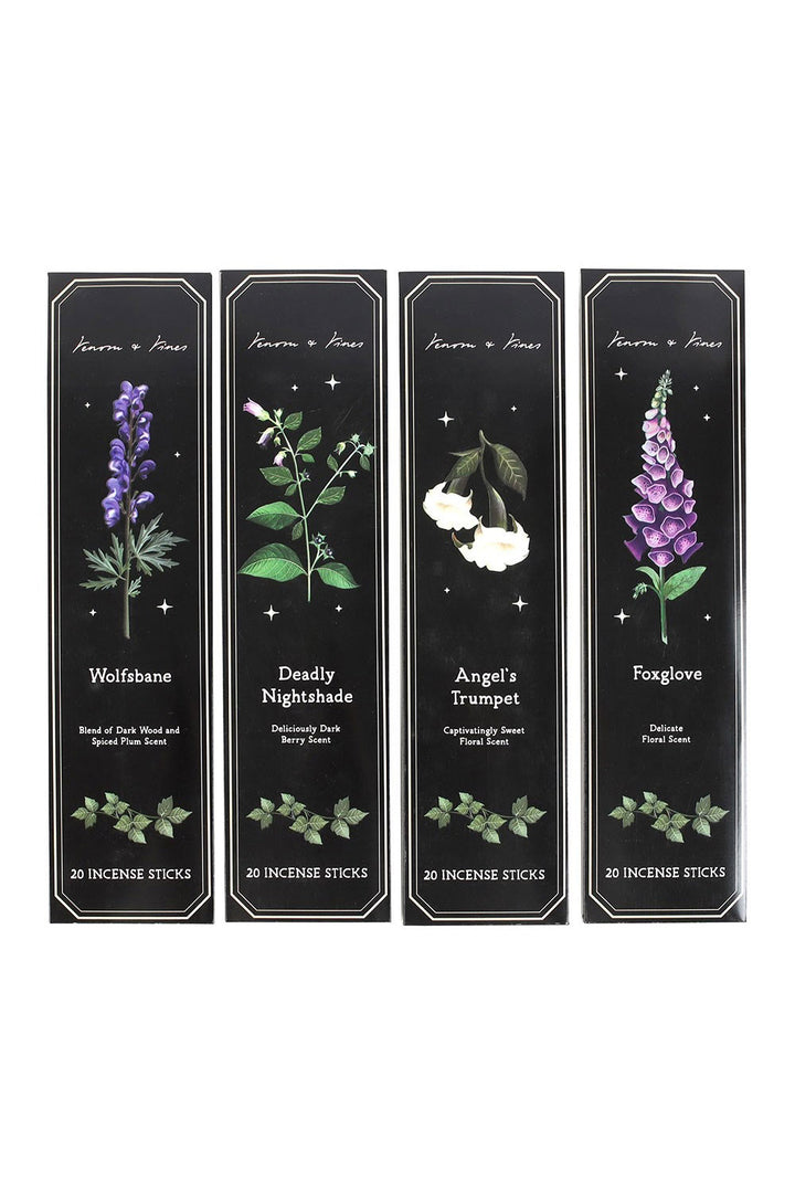 Four black incense boxes with botanical illustrations and names on a white background
